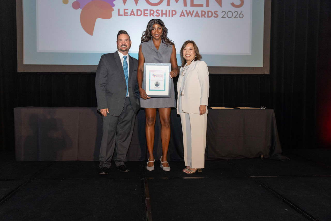 Dr. Mimi Nartey Receives Community Impact Award Dr. Mimi Nartey accepting Community Impact Award at LA Business Journal event.