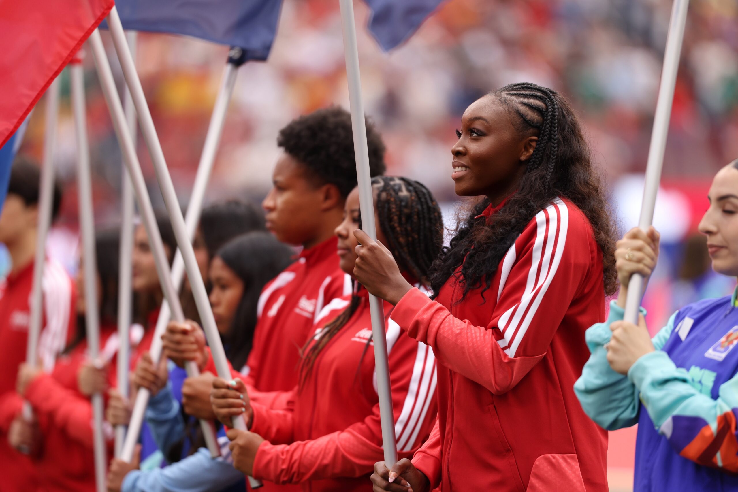 Field Notes 002 – Image 1 Liya serving as a FIFA Flag Bearer before the FIFA Women’s World Cup match between Spain and Austria.