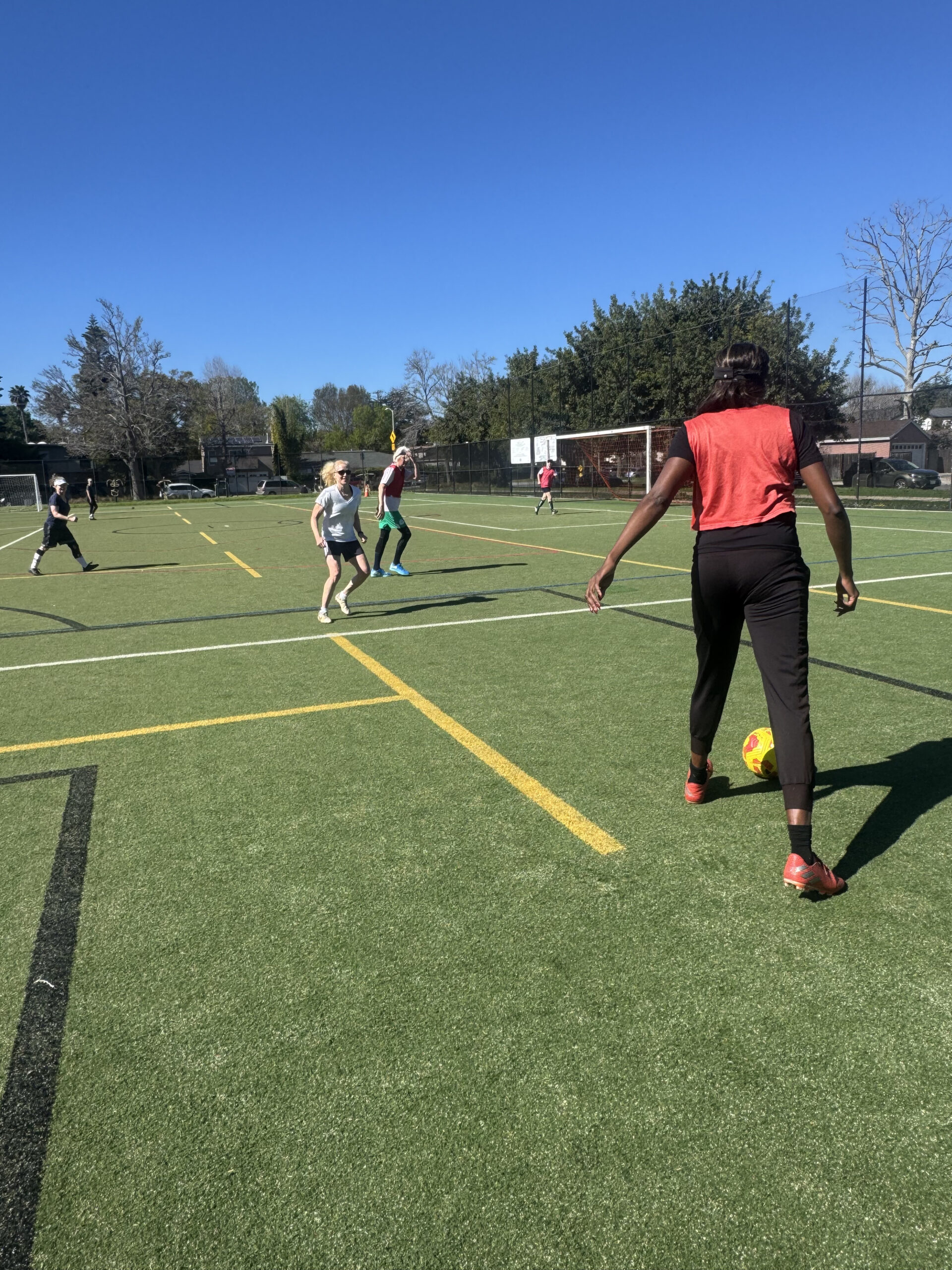 Field Notes 010 – Image 1 Dr. Mimi Nartey playing in her Over-40 women’s league.