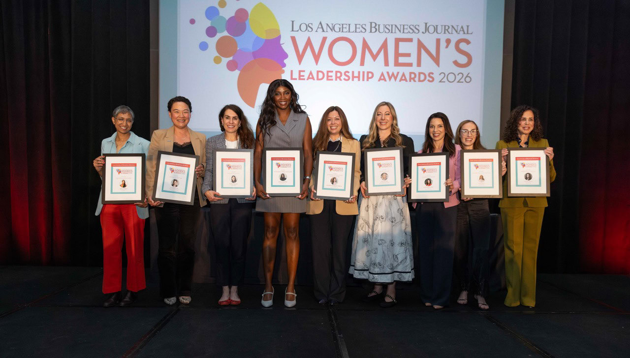Group of women holding awards at LA Women's Leadership event 2026.