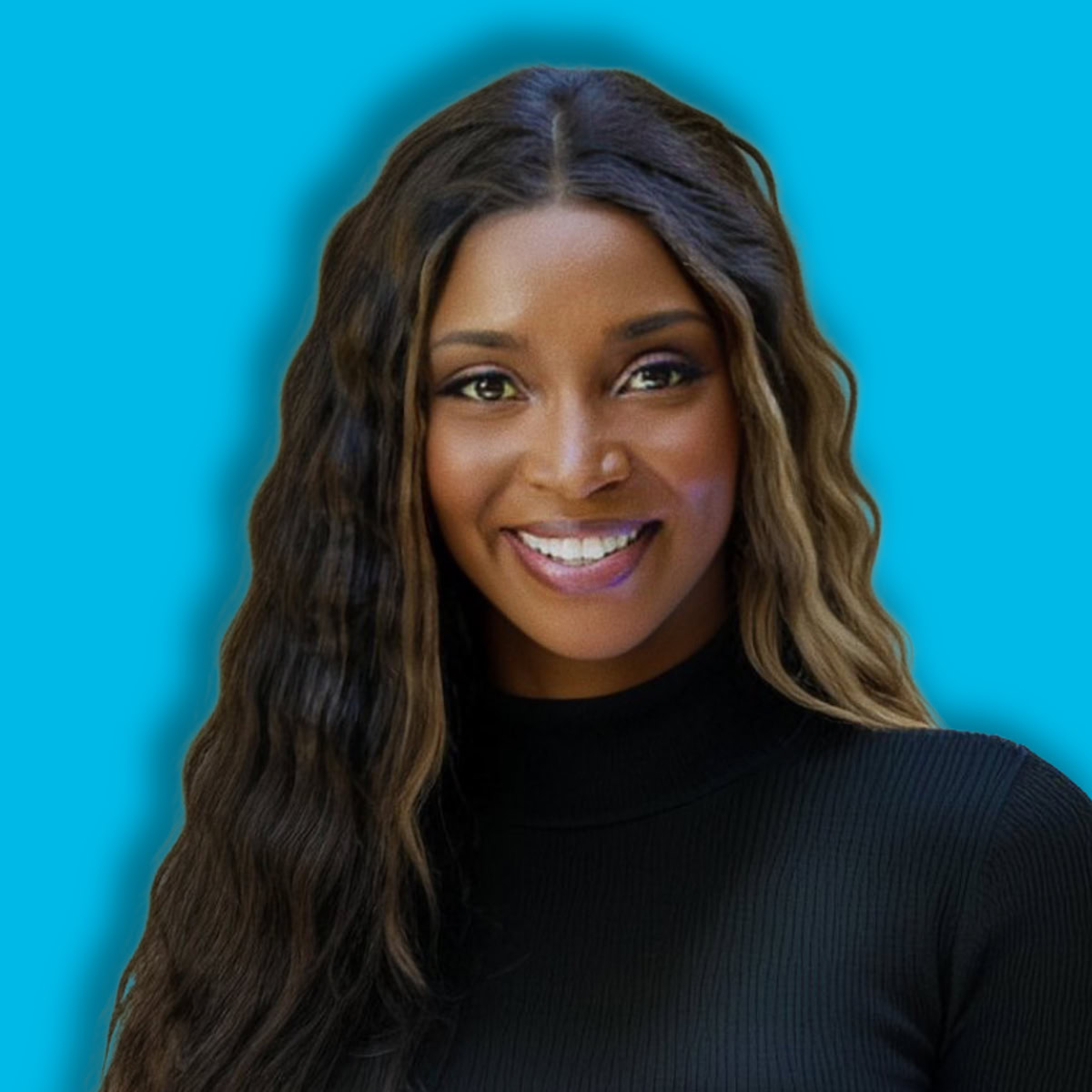 Professional portrait of a woman with long wavy hair smiling.