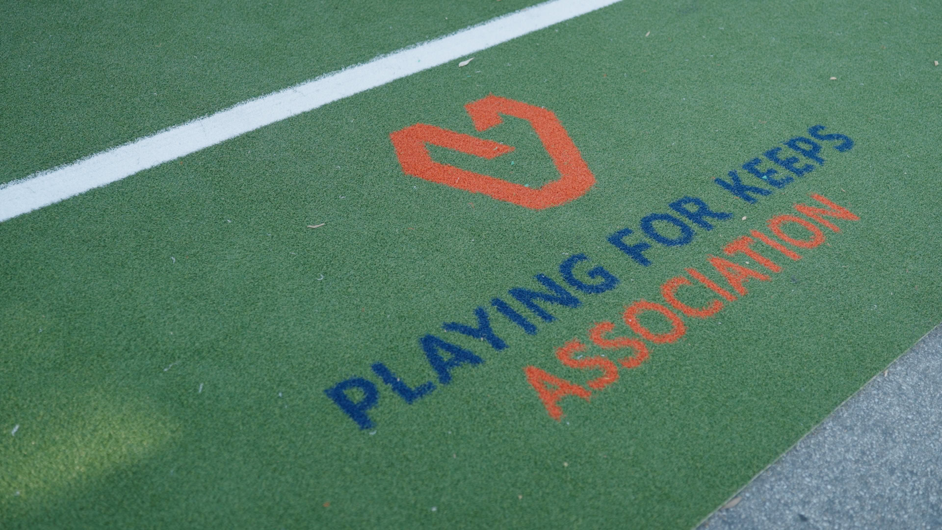 Installer logo on green turf with 'Playing for Keeps Association' text.