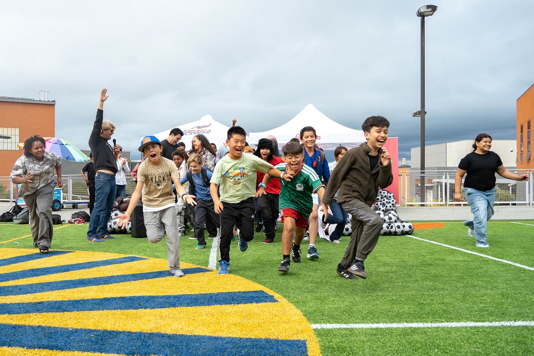 San Francisco School Fields 2026: Willie Brown Middle School Students run and cheer across a new synthetic turf field at a San Francisco middle school.